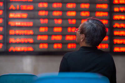 Trung Quốc cảnh báo nguy cơ bong bóng tài sản, chứng khoán châu Á quay đầu giảm mạnh