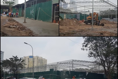 Ngang nhiên xây dựng nhà xưởng, bãi xe không phép trên đất dự án ở phường Dịch Vọng