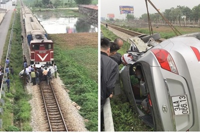 Ô tô bẹp dúm sau va chạm với tàu hỏa, 2 người tử vong