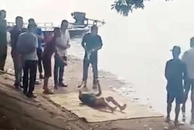 Hà Nội: Hoảng hồn phát hiện thi thể cô gái nổi trên hồ Linh Đàm