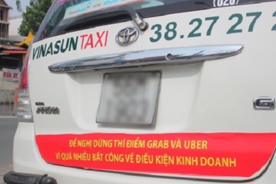 Sở GTVT Hà Nội, TP HCM yêu cầu các hãng taxi gỡ khẩu hiệu phản đối Uber, Grab