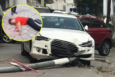 Hà Nội: Xe Audi "hạ gục" cột đèn chiếu sáng, 1 nam nhân viên ngân hàng bị thương
