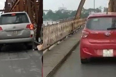 Phạt nghiêm xe ô tô bất chấp biển cấm đi lên cầu Long Biên