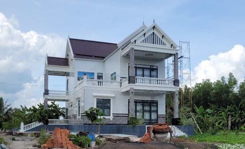 Ngôi nhà tầng kiên cố của ông Nguyễn Vĩnh Nghi trên lâm phần U Minh Hạ (ảnh Hoàng Nam)