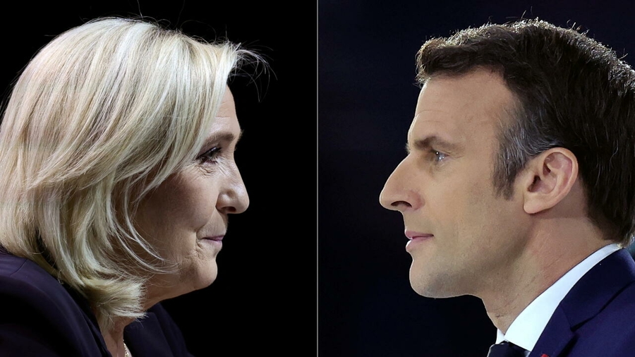 Các khảo sát dự báo một cuộc chạy đua sát sao giữa hai ứng viên Tổng thống Pháp. Ảnh: Reuters.