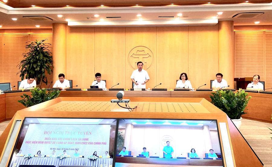 Phó Chủ tịch UBND TP Hà Nội Chử Xuân Dũng phát biểu tham luận tại hội nghị trực tuyến toàn quốc triển khai các chính sách tín dụng thực hiện Nghị quyết số 11/NQ-CP ngày 30/1/2022 của Chính phủ về Chương trình phục hồi và phát triển kinh tế - xã hội.