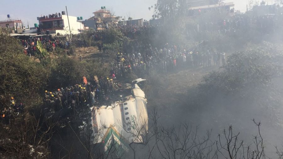 Hiện trường rơi máy bay ở Nepal hôm 15/1. Ảnh: CNN