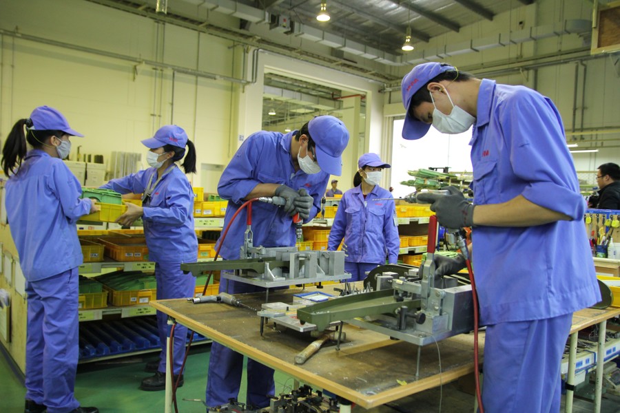 Sản xuất cánh tà cho máy bay Boeing  tại Công ty TNHH MHI Aerospace Việt Nam. Ảnh: Phạm Hùng