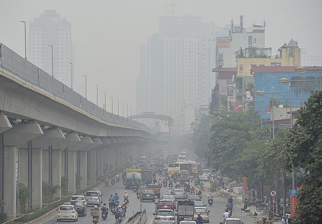 Ngày cuối tuần chất lượng không khí tại Hà Nội ở mức xấu - Ảnh 1
