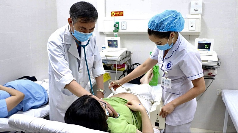 [Ảnh] Tiêm vaccine phòng Covid-19 cho phụ nữ mang thai tại Hà Nội - Ảnh 7
