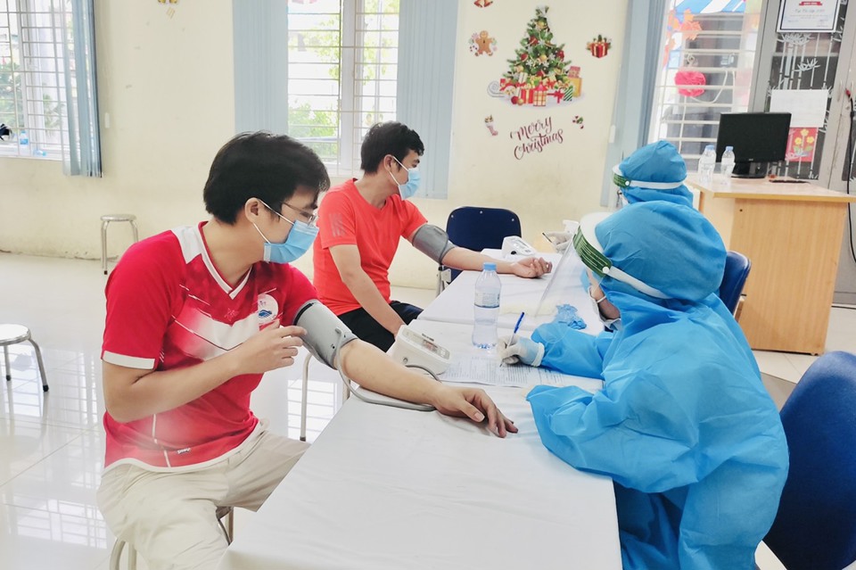 Chùm ảnh: Quận Thanh Xuân đẩy nhanh chiến dịch tiêm chủng vaccine phòng Covid-19 quy mô lớn - Ảnh 3