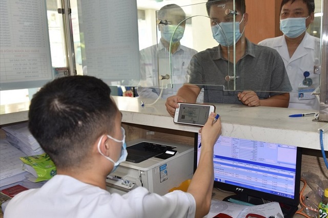 Bảo hiểm xã hội Việt Nam đẩy mạnh chuyển đổi số phục vụ người dân - Ảnh 1