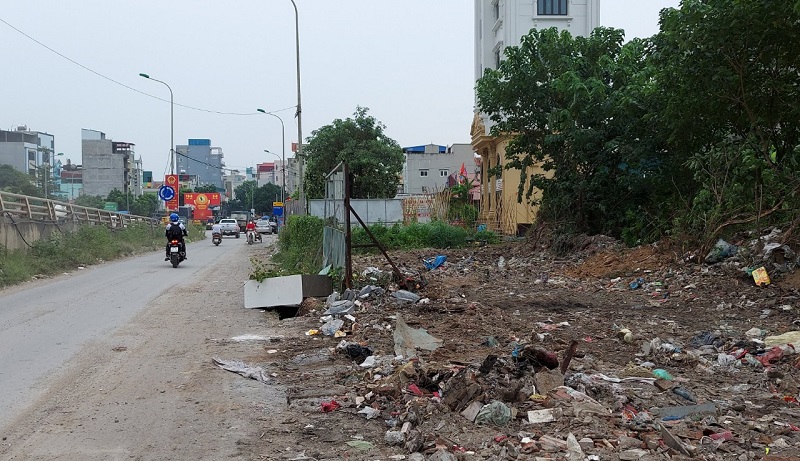 Huyện Hoài Đức: Đã xử lý dứt điểm bãi rác gây ô nhiễm tại chân cầu vượt xã An Khánh - Ảnh 2