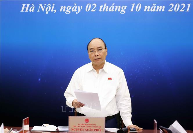Chủ tịch nước Nguyễn Xuân Phúc tiếp xúc cử tri doanh nghiệp TP Hồ Chí Minh - Ảnh 1