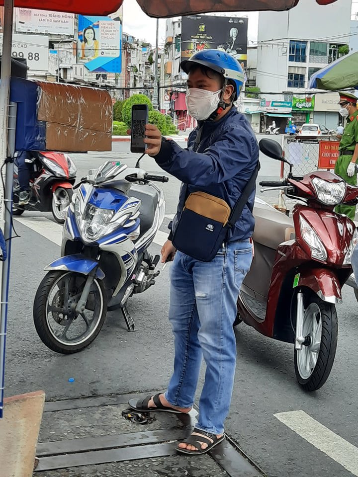 TP Hồ Chí Minh: Quét mã QR phát hiện 63 F0 lưu thông ngoài đường - Ảnh 2