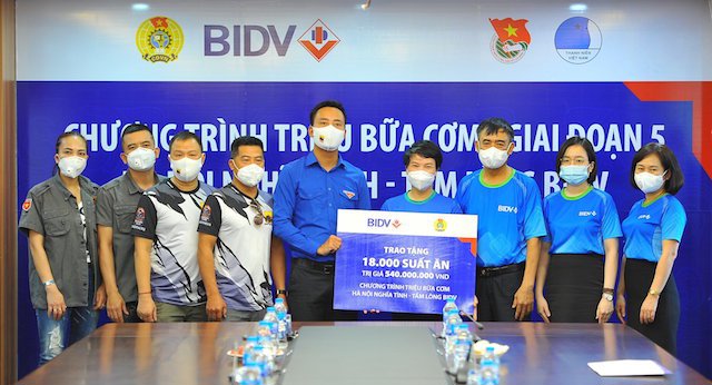 BIDV trao 18.000 suất cơm đến người dân khó khăn, bệnh nhân nghèo tại Hà Nội - Ảnh 1