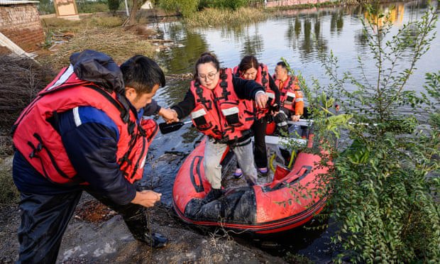 Lũ lụt kinh hoàng tại Trung Quốc: Ít nhất 29 người chết, hàng trăm ngàn người phải đi sơ tán - Ảnh 1