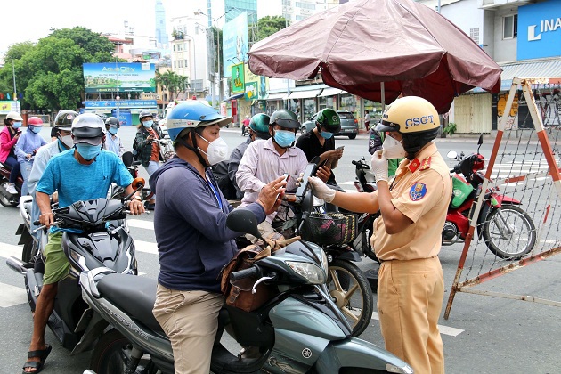 Đã hoàn chỉnh phương án tổ chức đi lại giữa TP Hồ Chí Minh và 4 tỉnh lân cận - Ảnh 1