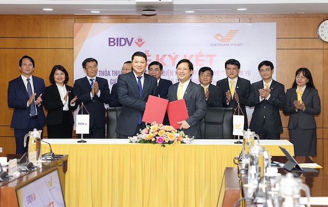 BIDV và Vietnam Post ký kết thỏa thuận hợp tác toàn diện - Ảnh 1