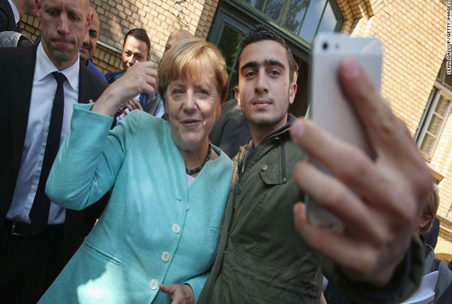 Hành trình 16 năm “chèo lái” Đức vượt nhiều cuộc khủng hoảng của bà Merkel - Ảnh 2