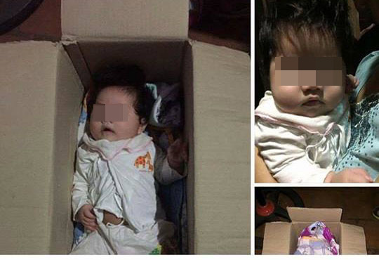 Bé gái 4 tháng tuổi bị bỏ rơi trong thùng giấy - Ảnh 1