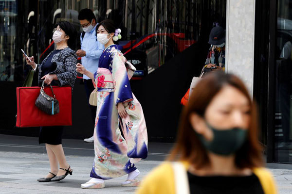 Nhật Bản gia hạn tình trạng khẩn cấp thêm 3 tuần do số ca nhiễm Covid-19 vẫn cao - Ảnh 1