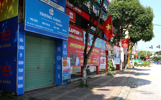 Huyện Sóc Sơn: Người dân, cơ sở kinh doanh thực hiện nghiêm giãn cách xã hội - Ảnh 1