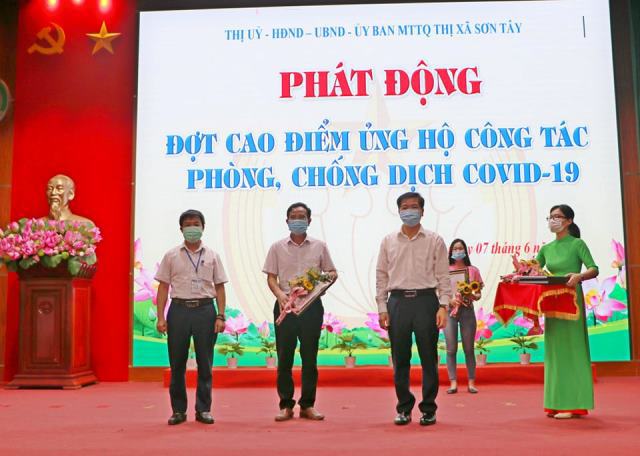 Thị xã Sơn Tây phát động phong trào ủng hộ Quỹ vaccine phòng, chống Covid-19 - Ảnh 1