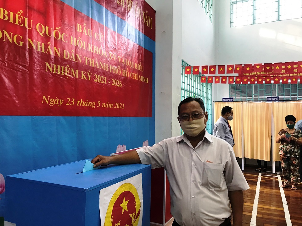 TP Hồ Chí Minh: Cử tri hào hứng đi bầu cử và chấp hành nghiêm việc phòng chống dịch Covid-19 - Ảnh 7