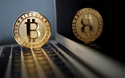 Bitcoin rớt giá thảm hại sau khi Trung Quốc cấm tiền ảo - Ảnh 1