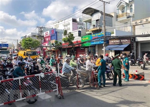 TP Hồ Chí Minh: Phong tỏa một khu phố hơn 2000 dân ở quận 8 do ca mắc Covid-19 tăng cao - Ảnh 1