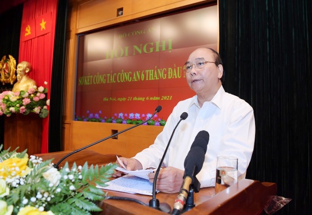 Chủ tịch nước Nguyễn Xuân Phúc dự Hội nghị sơ kết công tác công an 6 tháng đầu năm - Ảnh 2
