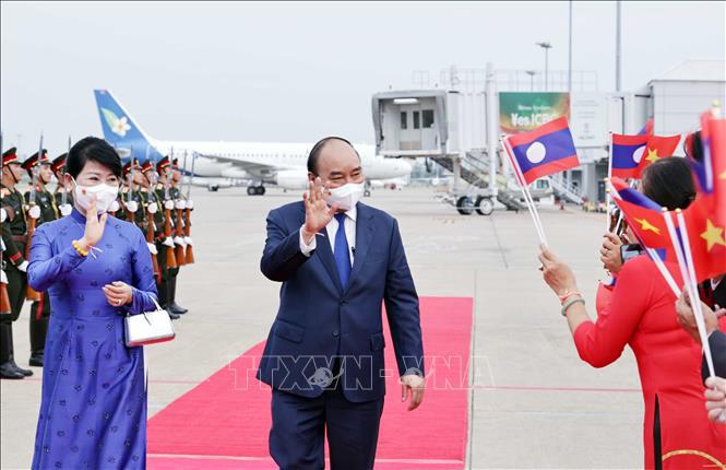 Chủ tịch nước Nguyễn Xuân Phúc kết thúc tốt đẹp chuyến thăm hữu nghị chính thức Lào - Ảnh 2