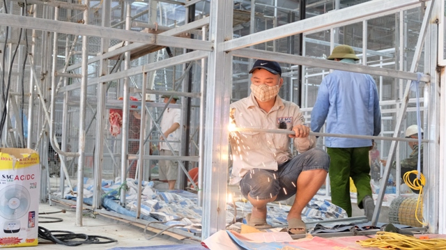 Hà Nội: Tiểu thương tất bật chuẩn bị vào kinh doanh tại chợ trung tâm huyện Sóc Sơn - Ảnh 2