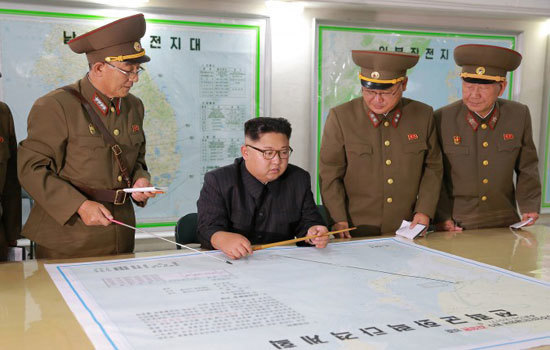 Lãnh đạo Triều Tiên tiết lộ kế hoạch tấn công vùng biển gần đảo Guam - Ảnh 1