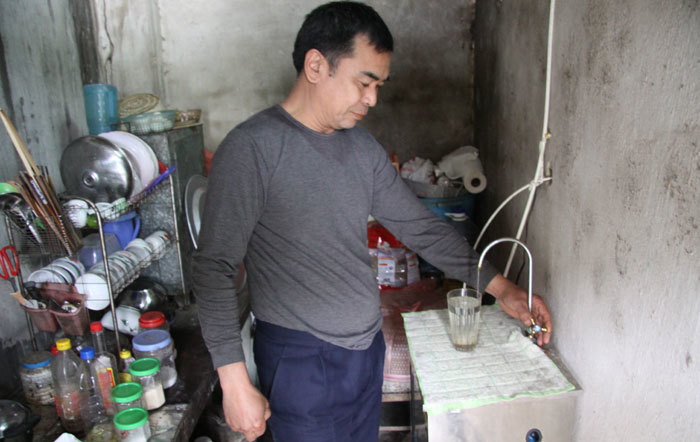 65% hộ dân vùng ảnh hưởng 1.000m từ khu xử lý chất thải Sóc Sơn đã có nước sạch - Ảnh 1
