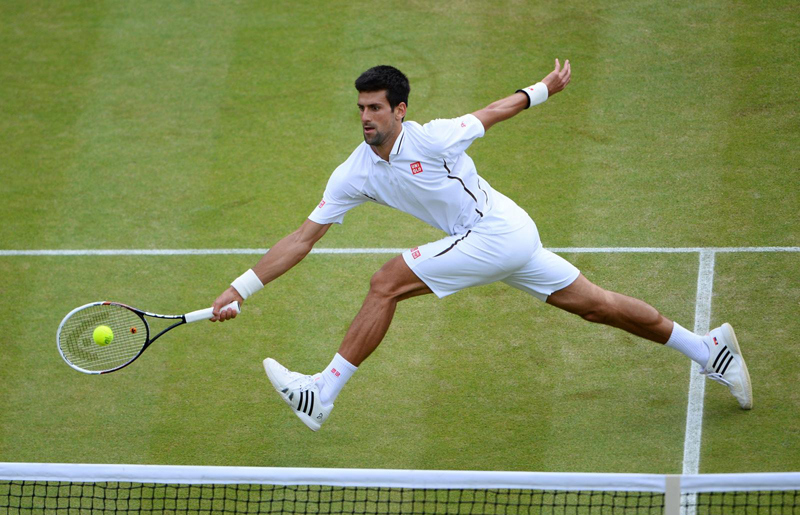 Vòng 2 Wimbledon: Djokovic thị uy sức mạnh, Federer dễ dàng đi tiếp - Ảnh 1