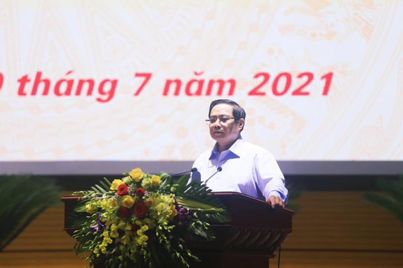 Thủ tướng Phạm Minh Chính: Việt Nam quyết tâm thực hiện thành công chiến dịch tiêm chủng vaccine phòng Covid-19 - Ảnh 1