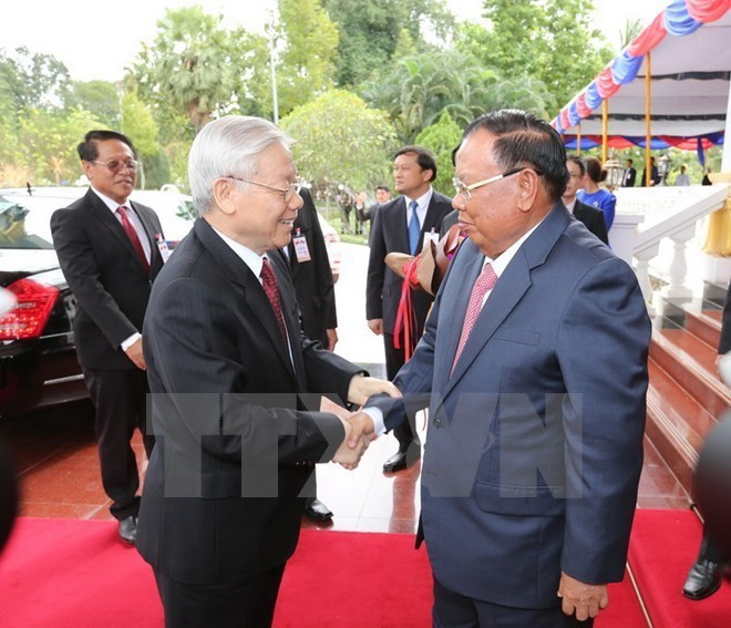 Điện mừng nhân kỷ niệm 55 năm ngày lập quan hệ ngoại giao Việt Nam-Lào - Ảnh 1