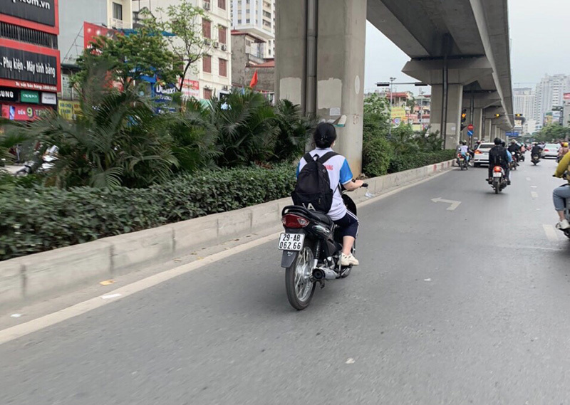 Hà Nội: Gia tăng tình trạng người tham gia giao thông không đội mũ bảo hiểm - Ảnh 8