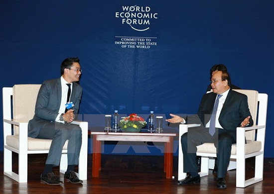 Thủ tướng tiếp các lãnh đạo WEF, AIIB và Tập đoàn Cisco - Ảnh 1