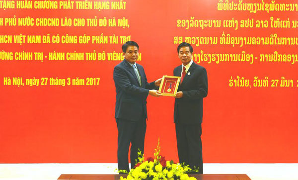 Hà Nội nhận Huân chương hạng Nhất của CHDCND Lào - Ảnh 1