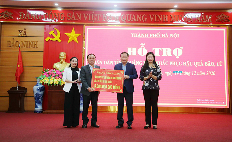 Hà Nội hỗ trợ kinh phí xây, sửa nhà cho người dân tỉnh Quảng Bình - Ảnh 1