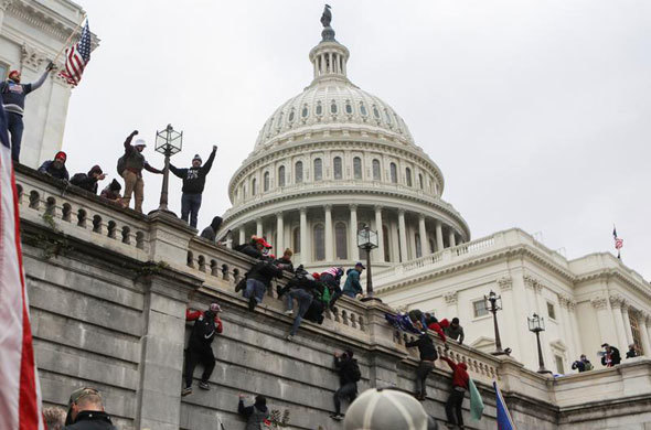 Các lãnh đạo thế giới sốc khi người biểu tình xông vào Điện Capitol - Ảnh 1