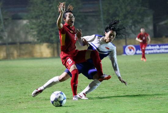 Thắng Singapore 8-0, ĐT nữ Việt Nam vươn lên đầu bảng - Ảnh 1