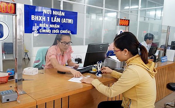 Bảo hiểm xã hội Việt Nam: Bảo đảm an sinh cho người dân vùng lũ - Ảnh 1