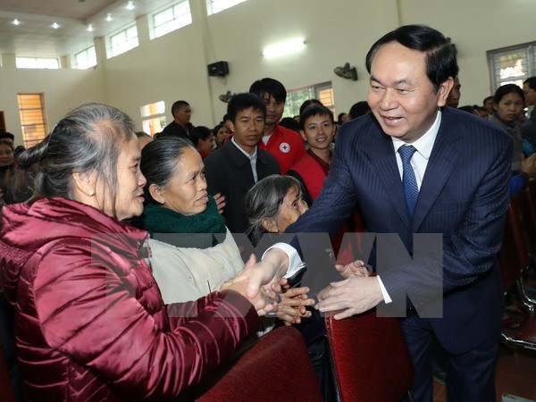 Chủ tịch nước Trần Đại Quang thăm chúc Tết tại tỉnh Nghệ An - Ảnh 1