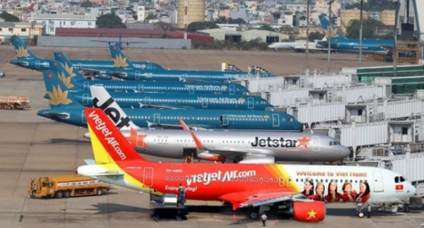 Giá sàn vé máy bay: Vì sao Jetstar lo ngại, Vietjet ủng hộ? - Ảnh 1