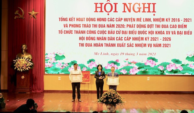 Huyện Mê Linh nhận bằng khen của Chính phủ trong công tác phòng, chống dịch Covid-19 - Ảnh 1