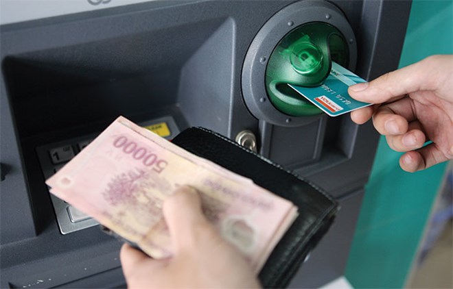 Ngân hàng Nhà nước yêu cầu dịch vụ ATM thông suốt dịp Tết Nguyên đán - Ảnh 1